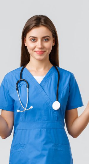 Healthcare workers, prevent virus, insurance and medicine concept. Supportive professional female nurse or doctor in blue scrubs, stethoscope, show thumbs-up in approval, smiling.